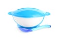 Light blue plastic baby bowl with spoon isolated. First food
