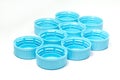 Light blue plastic bottle caps Royalty Free Stock Photo