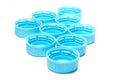 Light blue plastic bottle caps Royalty Free Stock Photo