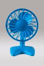 Light blue, plastic, portable, electric fan Royalty Free Stock Photo