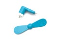 A light blue portable mini fan for smartphone devices