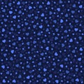 Light blue purple hearts on a blue black background. Decorative festive pattern of hearts.