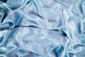 Light blue satin background and texture. Grooved of blue fabric abstract. Top view with empty space. Royalty Free Stock Photo