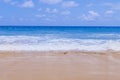 Light blue sea waves on clean sandy beach, Tropical white sand beach and soft sunshine background Royalty Free Stock Photo