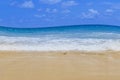 Light blue sea waves on clean sandy beach, Tropical white sand beach and soft sunshine background Royalty Free Stock Photo