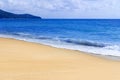 Light blue sea waves and island on clean sandy beach, Tropical white sand beach and soft sunshine background Royalty Free Stock Photo