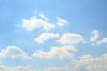 Light blue sky with fluffy clouds Ether background