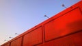 Light-blue sky and orange building