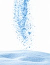 Light Blue Snow Powder Falling on White Background Royalty Free Stock Photo