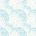 Light blue spatter paint effect circles on white background. Seamless vector pattern with fresh bubbly vibe. Great for