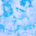 Light blue spring sky with clouds Royalty Free Stock Photo