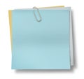 Light blue sticky note paper with paper clip isola Royalty Free Stock Photo