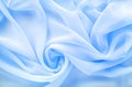 Light blue transparent fabric draped with large folds