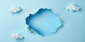 Light Blue Wall With Large Torn Hole. Blue Paper Wall With White Clouds on Isolated Background Royalty Free Stock Photo