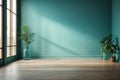 Light Blue Wall and Sunlight from the Window on the Wall in empty room. Royalty Free Stock Photo