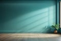 Light Blue Wall and Sunlight from the Window on the Wall in empty room. Royalty Free Stock Photo