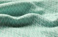 Light blue woolen fabric with geometrical pattern, closeup Royalty Free Stock Photo