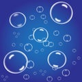 Underwater fizzing air bubbles stream on white background. Fizzy sparkles in water, sea, aquarium. Soda pop. Champagne. Effervesce