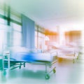 Light blur luxury hospital corridor ward, blurred background of clinic interior with defocus effect- AI generated image Royalty Free Stock Photo