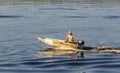 Light boat with motor moves against the stream of water