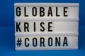 A light box with the inscription: GLOBALE  #CORONA Royalty Free Stock Photo