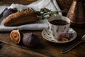 Light breakfast with coffee, bread and few figs. Royalty Free Stock Photo