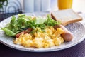 Light breakfast of omelette, sausage and salad Royalty Free Stock Photo