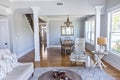 A light and bright open concept living room den with vaulted ceilings in a new construction house Royalty Free Stock Photo