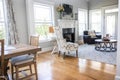 A light and bright open concept living room den with vaulted ceilings in a new construction house Royalty Free Stock Photo