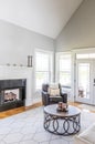 A light and bright open concept living room den with vaulted ceilings in a new construction house Royalty Free Stock Photo