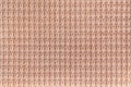 Light brown background from soft fleecy fabric close up. Texture of textiles macro Royalty Free Stock Photo