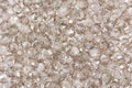 Light brown, beigre glass beads close-up in texture form. Royalty Free Stock Photo