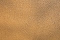 Light brown concrete wall texture for background usage with shadow. Orange rough backdrop. Stucco surface. Abstract Royalty Free Stock Photo