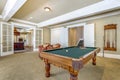 Light brown game room with billiard table Royalty Free Stock Photo