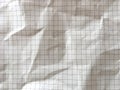 Light brown grid math paper wrinkled texture background