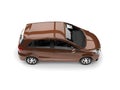 Light brown modern small compact car - top down view