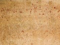 Light brown with streaks of a rusty wall of the garage. Royalty Free Stock Photo