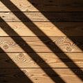 Light brown surface is illuminated by diagonal sunlight, casting Royalty Free Stock Photo