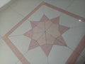light brown tiled floor with star decoration Royalty Free Stock Photo