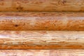 A light brown wood structure, wall of a house