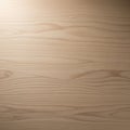 Light brown wooden surface with distinctive grain patterns. The texture is smooth, with Royalty Free Stock Photo