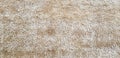 Light brown wool carpet or rug for background or wallpaper.