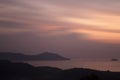 Light brown yellow and orange sunrise sky colors background. Sunset over the sea and mountains. Nature landscape backgrounds. Royalty Free Stock Photo