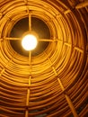 Light bulb in bamboo shade Royalty Free Stock Photo