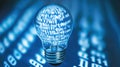 Light bulb with binary code on a blue hologram interface symbolizing an innovative tech concept Royalty Free Stock Photo