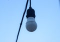 Light bulb, blue background clear sky Royalty Free Stock Photo