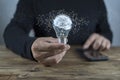 Light bulb with brain inside the hands of the businessman. The concept of the business idea Royalty Free Stock Photo