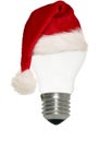 Light bulb with christmas cap Royalty Free Stock Photo