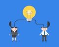 Light bulb connect with businesspeople, merge ideas concept