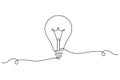 Light bulb continuous one line drawing on white background Royalty Free Stock Photo